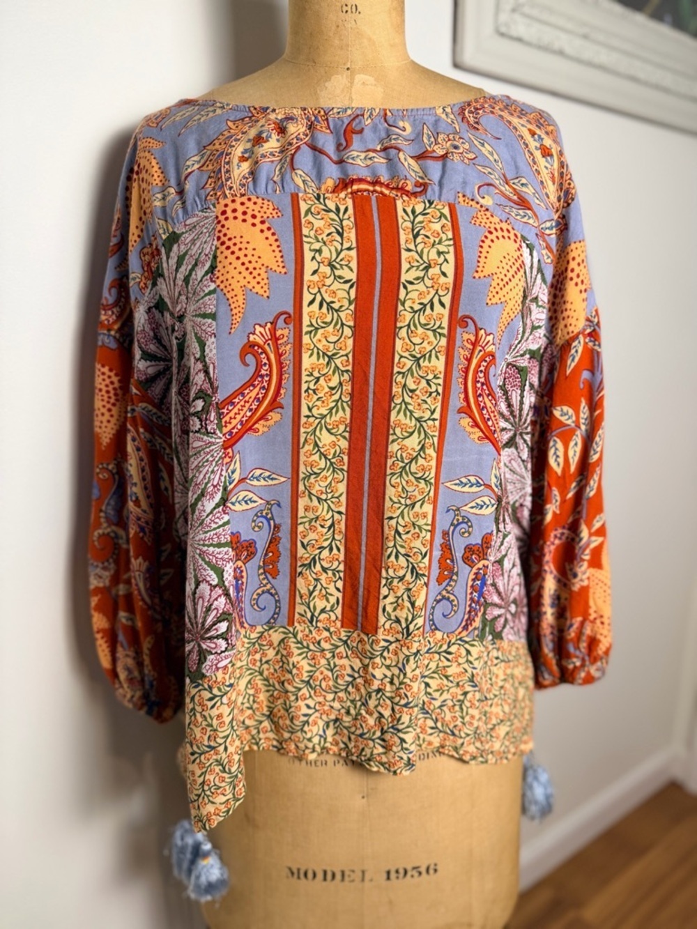 Anthropologie multi print pullover blouse with tassels XS